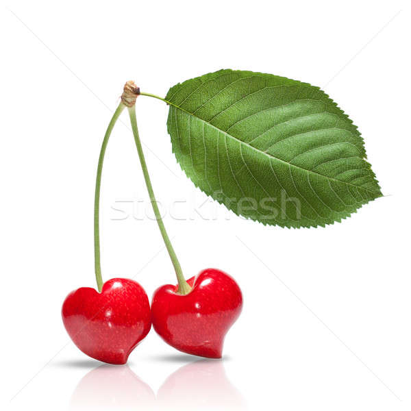 red cherry in shape of heart with leaf isolated on white Stock photo © artjazz