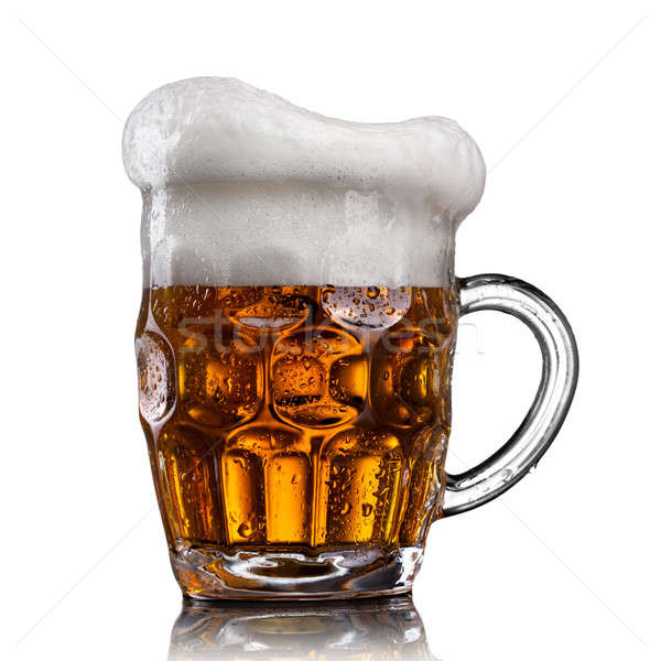 Beer in glass with water drops isolated on white  Stock photo © artjazz