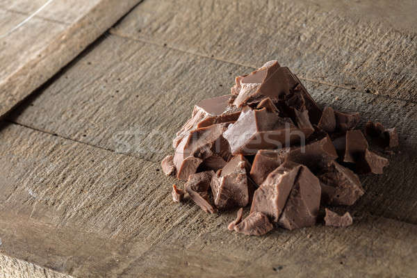 Foto stock: Peças · leite · chocolate · madeira · fundo