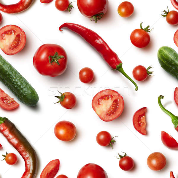 Red chili pepper, cucumber and tomato on white background . Stock photo © artjazz