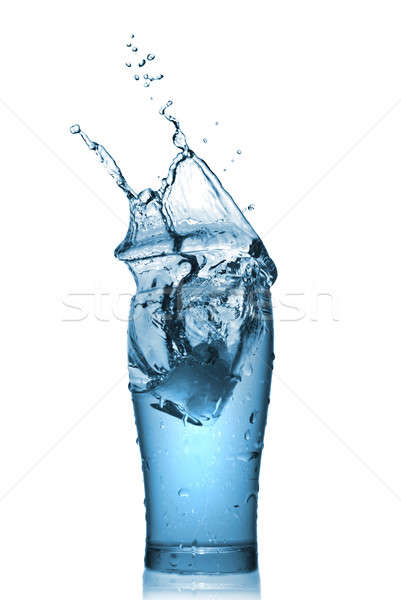 water splash in glass isolated on white Stock photo © artjazz