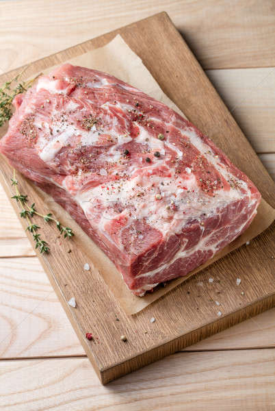 Photo of raw meat. Pork neck with herbs Stock photo © artjazz