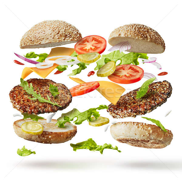 burger with flying ingredients Stock photo © artjazz