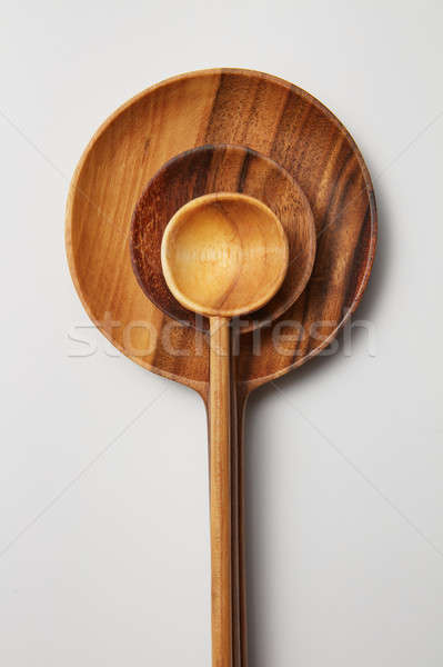 Wooden spoons of different sizes Stock photo © artjazz
