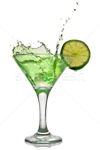 Green alcohol cocktail with splash isolated on white, Stock image