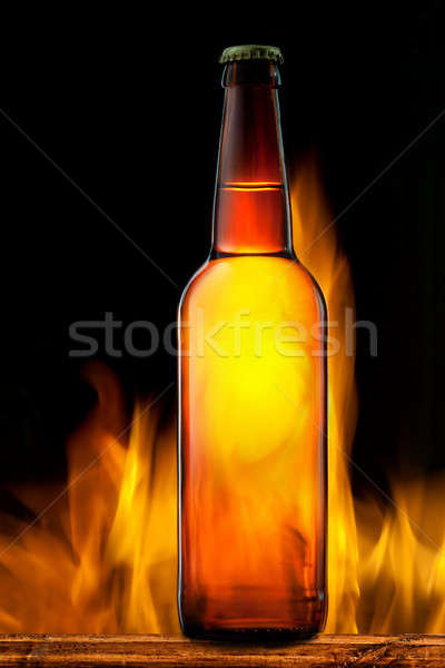 Sörösüveg tűz fekete absztrakt fény háttér Stock fotó © artjazz