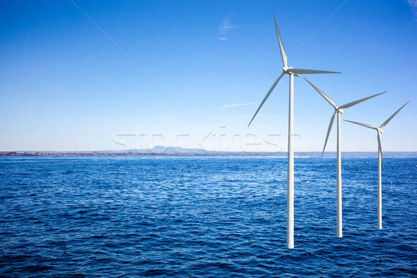 Wind generators turbines in the sea Stock photo © artjazz