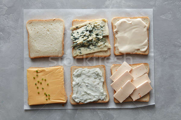 Set of different cheeses on toasts Stock photo © artjazz