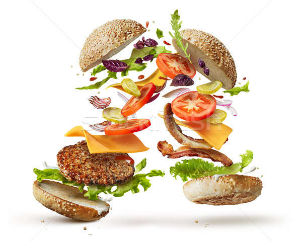 burger with flying ingredients Stock photo © artjazz