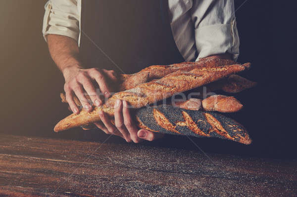 рук багеты деревянный стол Сток-фото © artjazz