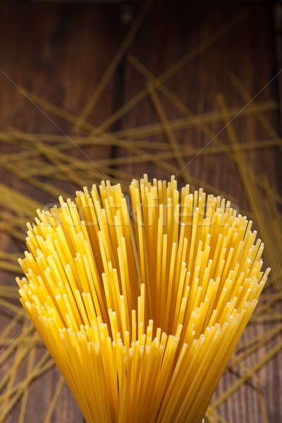 Stock photo: italian spaghetti on wooden background
