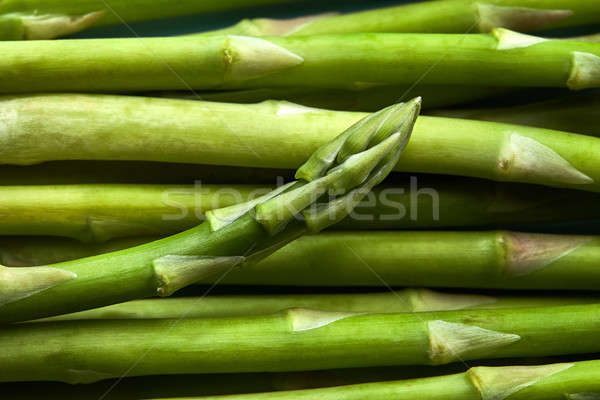 Texture of green asparagus view front Stock photo © artjazz