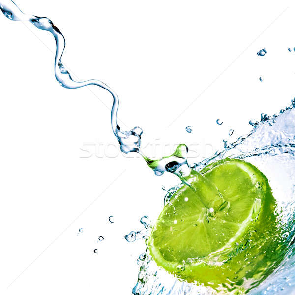 Stock photo: fresh water drops on lime isolated on white