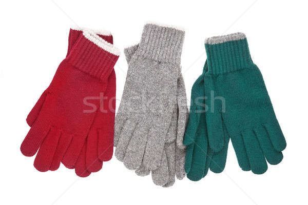 three pairs of knitted gloves Stock photo © artjazz