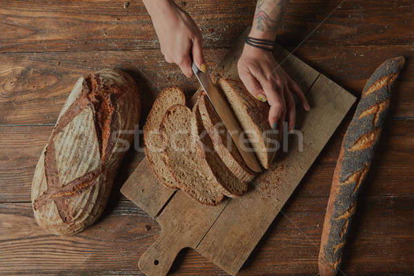 Stock photo: Sliced bread on a board