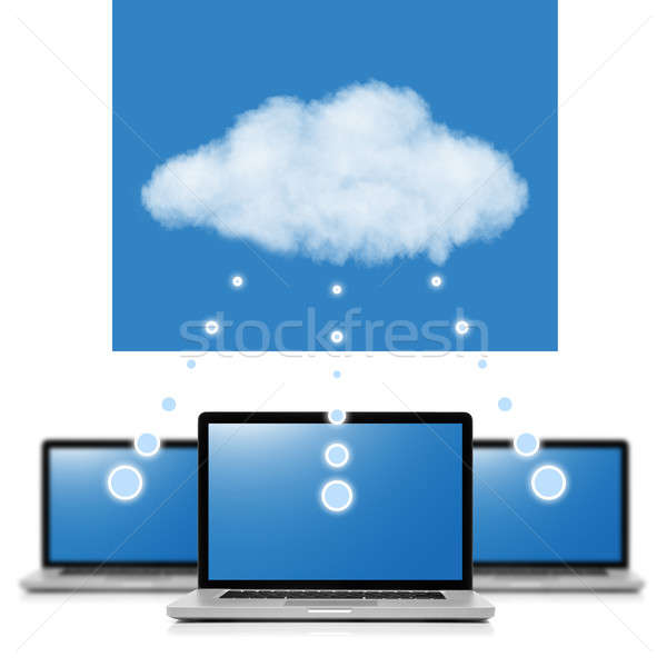 Cloud computing network concept. Notebooks linked with cloud iso Stock photo © artjazz