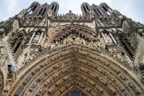 Architectural fragments of Notre-Dame de Reims cathedral facade Stock photo © artjazz