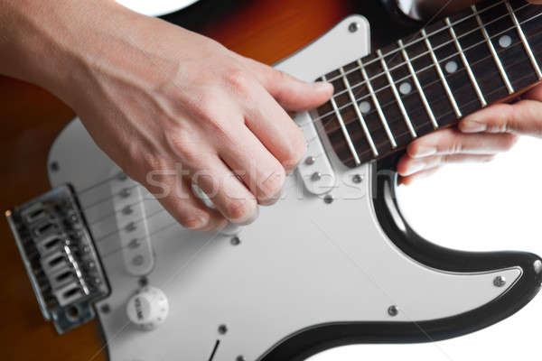 playing on electric guitar Stock photo © artjazz