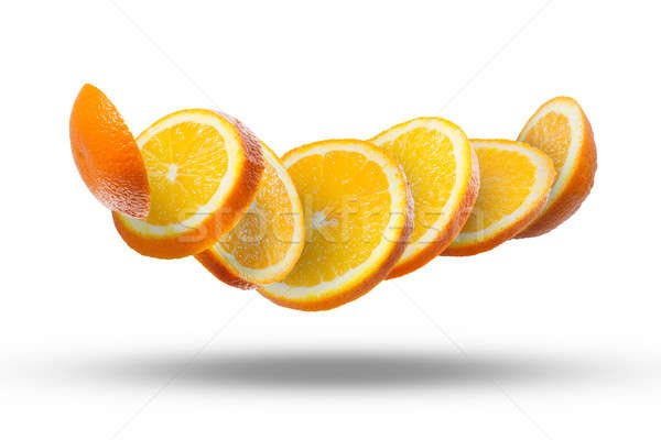 Imagine de stoc: Cădere · felii · portocaliu · aer · alb · izolat