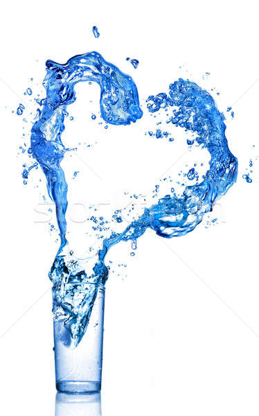 water splash in shape of heart in glass  Stock photo © artjazz