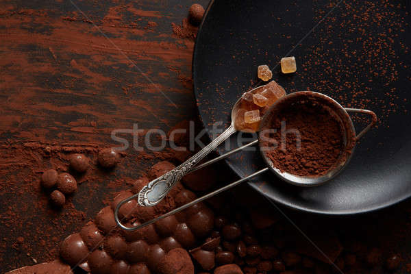 candies and cocoa powder Stock photo © artjazz