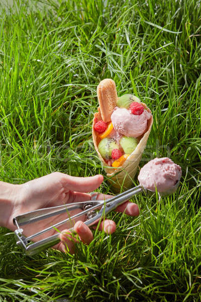Fruit ice cream in waffle cone Stock photo © artjazz