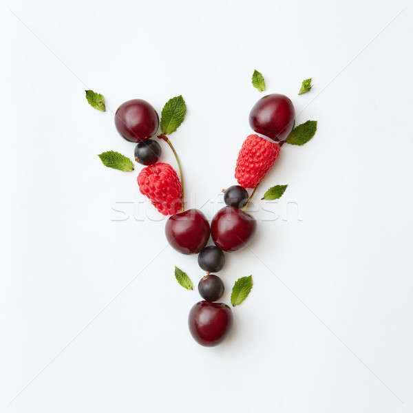 Natufal freshly picked fruits pattern of letter Y english alphabet from natural ripe berries - black Stock photo © artjazz