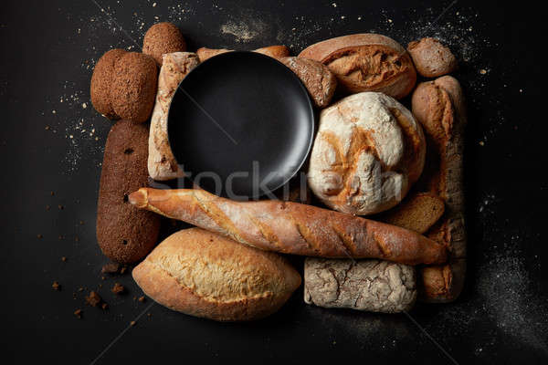 Different kinds of bread on background Stock photo © artjazz