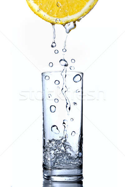 Stockfoto: Waterdruppels · glas · citroen · geïsoleerd · druppels