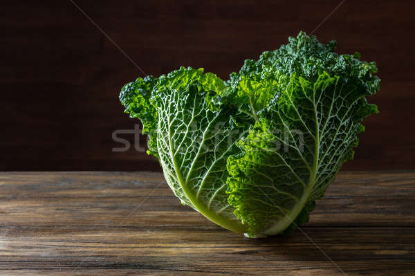 Single head of Savoy cabbage Stock photo © artjazz