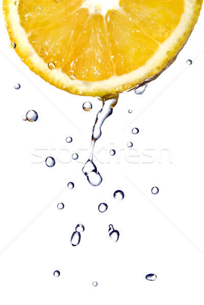 fresh water drops on orange isolated on white Stock photo © artjazz