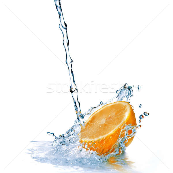 Stock photo: fresh water drops on orange isolated on white