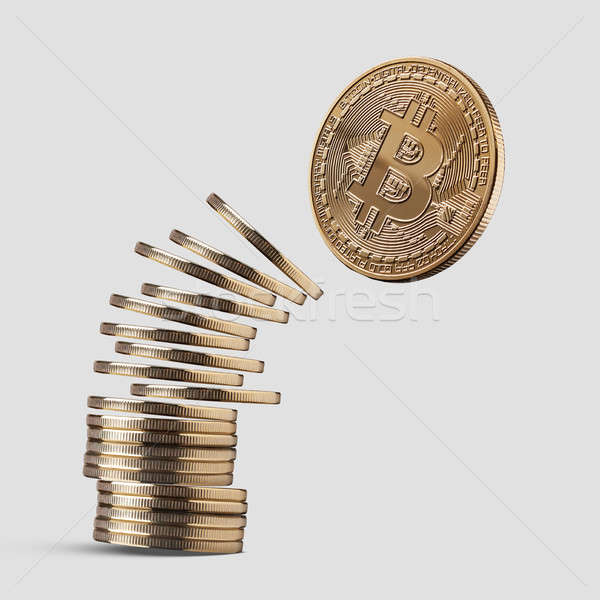 Disintegrate stick coin bitcoin on a gray background. Stock photo © artjazz