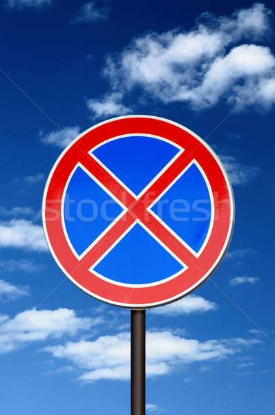 Stock photo: road sign no parking against blue sky and clouds