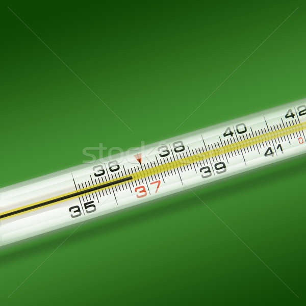 close-up thermometer on green background Stock photo © artjazz