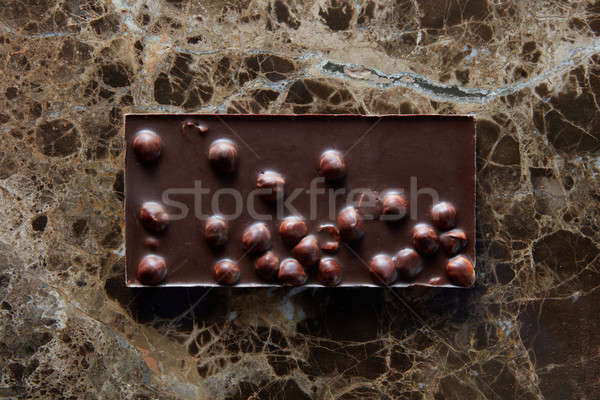 chocolate bar with nuts Stock photo © artjazz
