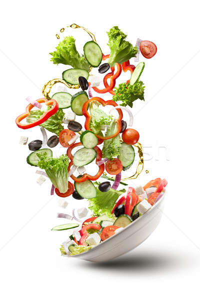 flying salad isloated on white Stock photo © artjazz