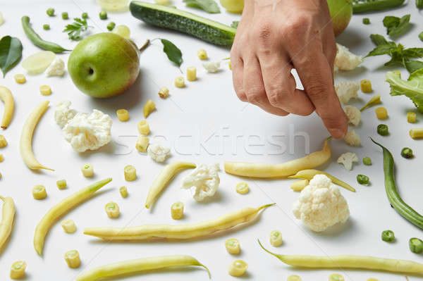 Stock photo: pear, cauliflower and beans on white background