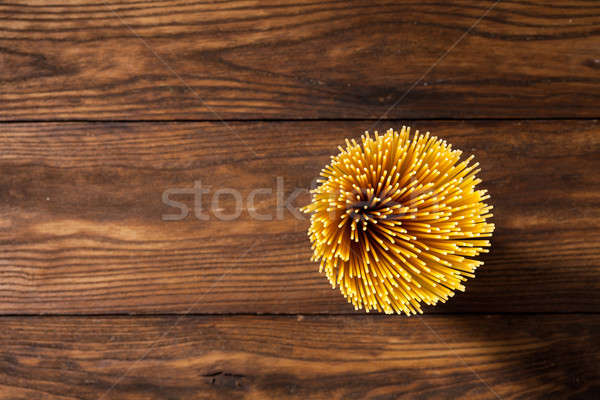 italian spaghetti on wooden background Stock photo © artjazz