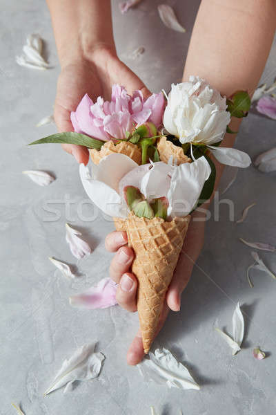 Greeting postcard of woman hold a waffle cup with beautiful pink Stock photo © artjazz