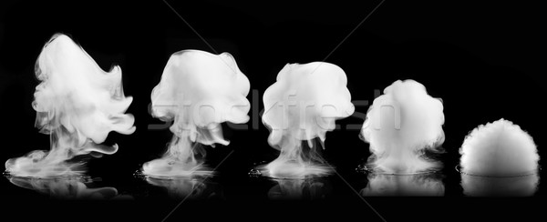 White smoke explosion isolated on black Stock photo © artjazz