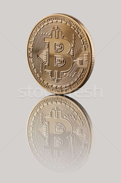 Oro bitcoin moneda gris reflexión Foto stock © artjazz