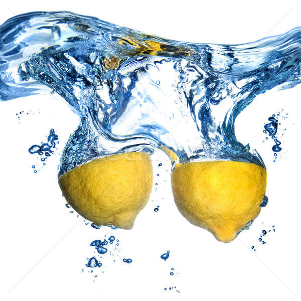 Frischen Zitrone Wasser Blasen isoliert weiß Stock foto © artjazz