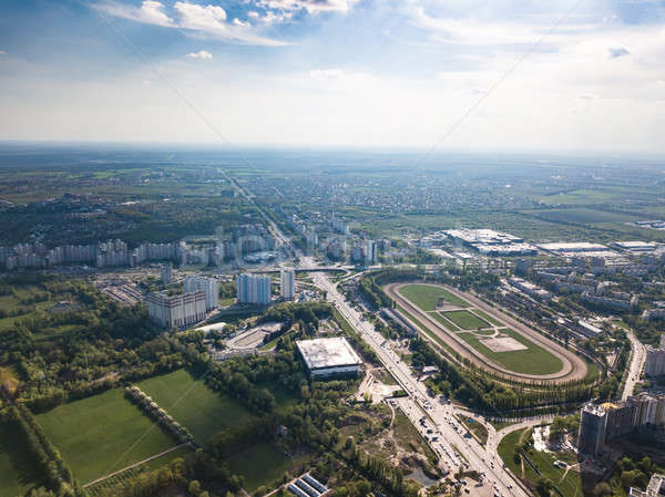 Aerial view landscape of the city of Kiev with a racecourse on a background of blue sky Stock photo © artjazz