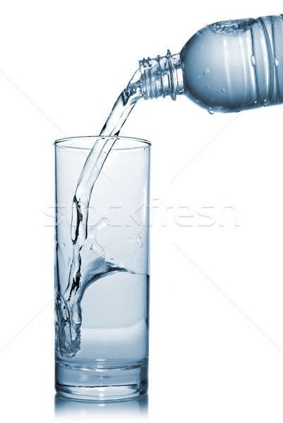 Wasser Gießen Glas Flasche isoliert Wildwasser Stock foto © artjazz