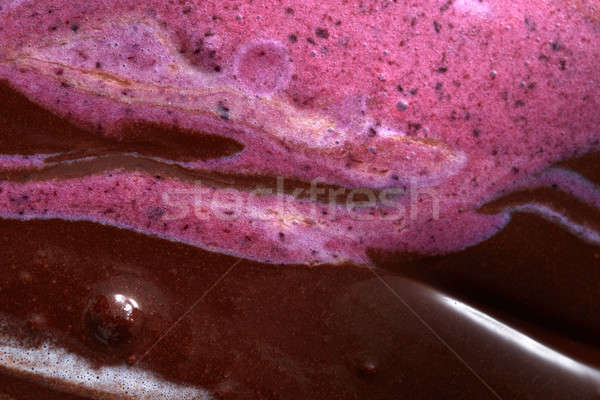 Abstract background of a mix colorful melted chocolate-berries i Stock photo © artjazz