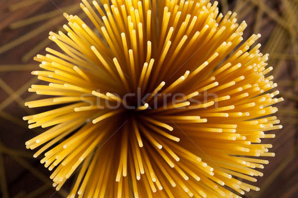 italian spaghetti on wooden background Stock photo © artjazz