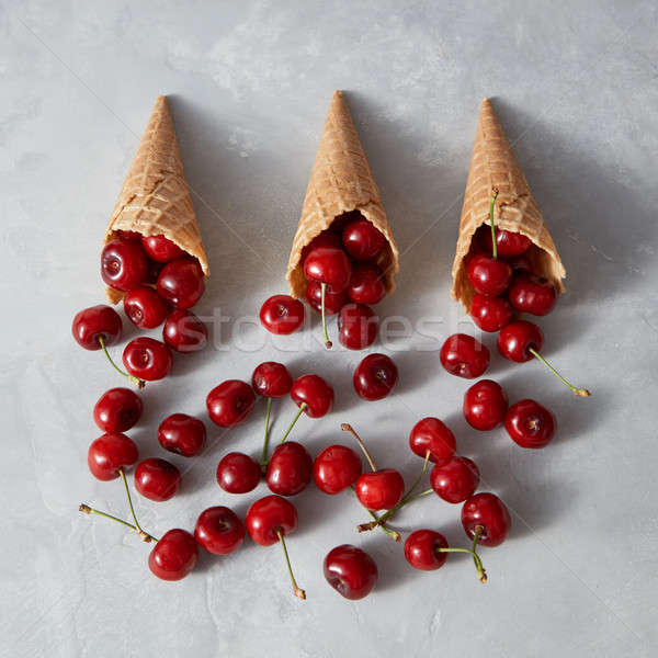 Stock photo: Summer fresh organic fruits pattern - cherry in a wafer cones on