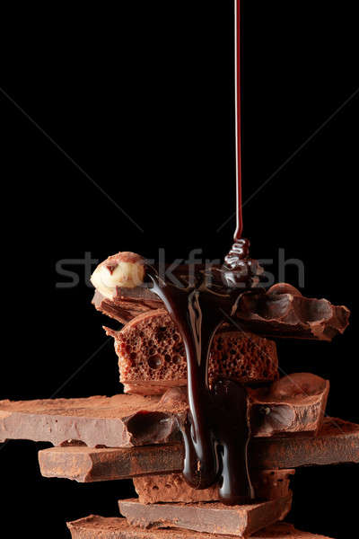Heap of broken pieces chocolate Stock photo © artjazz