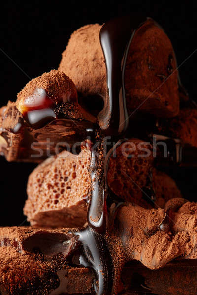 Heap of broken pieces chocolate Stock photo © artjazz